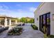 Exterior view of a home with a backyard patio, outdoor seating, a pool, and desert landscaping at 6650 N Hillside Dr, Paradise Valley, AZ 85253