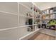 Spacious walk-in pantry with ample shelving for storage at 6931 W Spur Dr, Peoria, AZ 85383