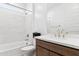 Bathroom featuring a tub and shower combination and a wooden vanity with white countertops at 7378 W Whitehorn Trl, Peoria, AZ 85383