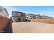 Spacious backyard with a covered patio offers ample space for recreation and relaxation at 7988 W Griswold Rd, Peoria, AZ 85345