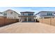 Large backyard featuring a covered patio, privacy wall, and an open layout for easy outdoor living at 7988 W Griswold Rd, Peoria, AZ 85345