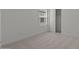 A spacious and carpeted bedroom with bright natural light, and featuring a closet for ample storage at 7988 W Griswold Rd, Peoria, AZ 85345