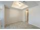 Neutral bedroom space with tiled floors, a recessed skylight, and a closet at 838 W Duke Dr, Tempe, AZ 85283