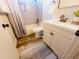 Cozy bathroom with white subway tile shower and modern vanity with matte black hardware at 9654 N 94Th Ave, Peoria, AZ 85345