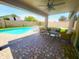 Inviting covered patio with a private pool perfect for outdoor entertaining and relaxation at 9654 N 94Th Ave, Peoria, AZ 85345