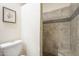 Bathroom with tile flooring, tiled shower and bench seat at 1021 S Greenfield Rd # 1213, Mesa, AZ 85206
