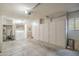 Spacious garage with ample storage cabinets, laundry area, and utility connections at 1021 S Greenfield Rd # 1213, Mesa, AZ 85206