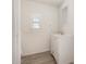 Bathroom with a white vanity, updated fixtures, and decorative wainscoting at 106 S 74Th St, Mesa, AZ 85208