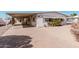 Well-maintained home featuring a spacious carport and low-maintenance landscaping at 106 S 74Th St, Mesa, AZ 85208