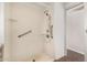 Bathroom walk-in shower with grab bar and adjustable shower head at 106 S 74Th St, Mesa, AZ 85208