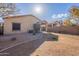 Exterior backyard featuring low maintenance landscaping, gravel, and partial sunshine at 1100 E Canyon Trl, San Tan Valley, AZ 85143