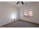Neutral bedroom with carpet, a lamp, and a window at 1100 E Canyon Trl, San Tan Valley, AZ 85143