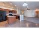 Traditional eat-in kitchen with an island and adjacent living space at 1100 E Canyon Trl, San Tan Valley, AZ 85143