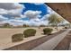 Manicured backyard overlooking the beautiful green golf course at 11069 E Kilarea Ave # 198, Mesa, AZ 85209
