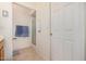 Well lit bathroom showing a shower, toilet, and door at 11069 E Kilarea Ave # 198, Mesa, AZ 85209