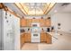 Well-lit kitchen with ample cabinet space and modern appliances, ready for cooking and entertaining at 11069 E Kilarea Ave # 198, Mesa, AZ 85209