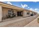 Outdoor patio with seating, BBQ, and serene landscape views at 11069 E Kilarea Ave # 198, Mesa, AZ 85209