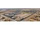 Aerial view of a new construction community in a desert setting, showcasing the layout and surrounding landscape at 11426 E Utopia Ave, Mesa, AZ 85212