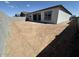 Large backyard with potential for a lush garden, pool, or outdoor living area, surrounded by privacy walls at 11426 E Utopia Ave, Mesa, AZ 85212