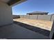 Expansive backyard with a privacy wall, perfect for outdoor entertaining and landscaping opportunities at 11426 E Utopia Ave, Mesa, AZ 85212