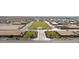 Wide aerial shot of a community park with green spaces, picnic areas, walking trails, and residential development nearby at 11426 E Utopia Ave, Mesa, AZ 85212