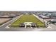 Expansive community park featuring a large grassy area, picnic pavilions, walking paths, and manicured landscaping for recreation at 11426 E Utopia Ave, Mesa, AZ 85212