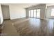 Bright living room with sliding glass doors leading to the backyard at 11426 E Utopia Ave, Mesa, AZ 85212