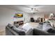 Cozy living room featuring tile flooring, a ceiling fan and comfortable seating at 11652 N 49Th Dr, Glendale, AZ 85304