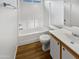 Clean bathroom featuring a shower-tub combo and classic fixtures at 11734 W Paradise Dr, El Mirage, AZ 85335