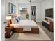 Serene bedroom featuring a comfortable bed, stylish furnishings, and ample natural light at 11734 W Paradise Dr, El Mirage, AZ 85335