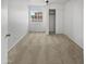 Cozy bedroom featuring plush carpet, natural light and a spacious closet at 11734 W Paradise Dr, El Mirage, AZ 85335