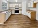 Functional kitchen with ample cabinet space and modern appliances, perfect for cooking enthusiasts at 11734 W Paradise Dr, El Mirage, AZ 85335