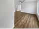 Bright living area with wood floors and archway at 11734 W Paradise Dr, El Mirage, AZ 85335