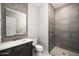 Modern bathroom showcasing a glass-enclosed shower, stylish fixtures, and a modern vanity with a white countertop at 14102 E Sonora Crest Dr, Fountain Hills, AZ 85268
