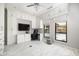 Bonus room with built in cabinets, storage, and views to the pool area at 14102 E Sonora Crest Dr, Fountain Hills, AZ 85268