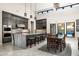 Bright kitchen with dark wood cabinets, stainless steel appliances, and a large island for seating at 14102 E Sonora Crest Dr, Fountain Hills, AZ 85268