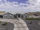 An aerial shot of home with horseshoe driveway and well manicured grounds at 1455 E Dove Pl, Casa Grande, AZ 85122