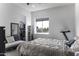 Comfortable bedroom with a window view and a walk in closet space, for extra storage at 1455 E Dove Pl, Casa Grande, AZ 85122