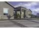 Close up exterior shot of home with decorative rock accents and front entryway at 1455 E Dove Pl, Casa Grande, AZ 85122
