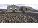 Beautiful front yard featuring decorative rock landscaping and a variety of shrubs at 1455 E Dove Pl, Casa Grande, AZ 85122