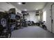 Cluttered garage interior provides ample storage space at 1455 E Dove Pl, Casa Grande, AZ 85122