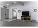 Open-concept living room featuring modern flooring and gray paint at 1455 E Dove Pl, Casa Grande, AZ 85122