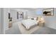 Cozy bedroom featuring plush carpeting, a comfortable bed, and soft natural light at 14628 W Sand Hills Rd, Surprise, AZ 85387
