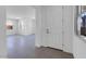 Open concept entryway and living space with tile flooring and plenty of natural light at 14628 W Sand Hills Rd, Surprise, AZ 85387