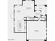 Open-concept floor plan with kitchen, dining area, great room, powder room and two-car garage on the first floor at 14628 W Sand Hills Rd, Surprise, AZ 85387