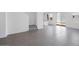 Spacious living room with ceramic tile floors offering a versatile living space at 14628 W Sand Hills Rd, Surprise, AZ 85387