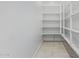 Walk-in pantry providing ample storage space with shelving at 15822 W Bronco Trl, Surprise, AZ 85387