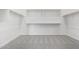 Walk-in closet with carpet, shelving and hanging rods at 15822 W Bronco Trl, Surprise, AZ 85387