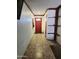 Entryway features tile flooring, neutral paint and a bright red front door at 17648 N 36Th St, Phoenix, AZ 85032
