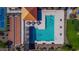 Aerial view of the community pool, tennis courts, bocce ball and seating areas at 18069 W Tina Ln, Surprise, AZ 85387